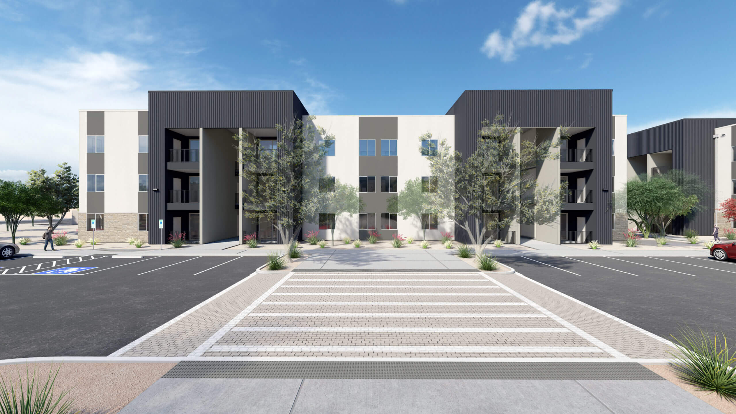 Modern apartment building with parking lot and trees